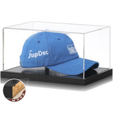 Front view of JupDec acrylic hat display case showcasing a baseball cap with crystal-clear transparency