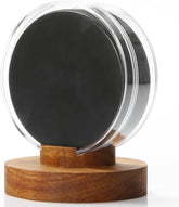 Clear acrylic hockey puck display case with wood base showing front view for memorabilia protection