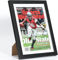 Sports Illustrated magazine frame with clear acrylic and wooden base, ideal for collectible covers.